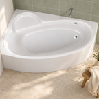 White Tennessee left-hand offset corner bath with curved panel and moulded seat in a tiled bathroom